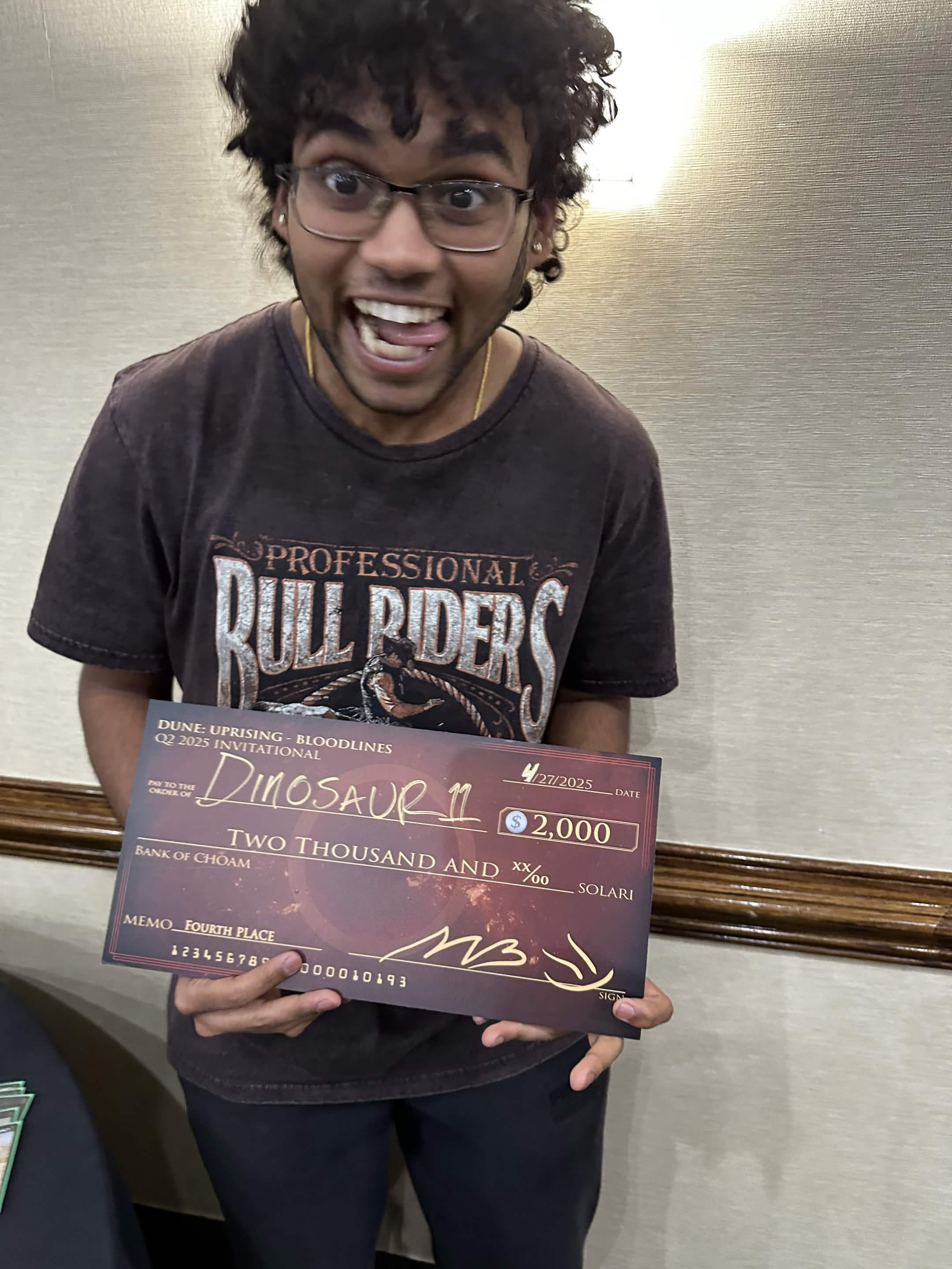 Ajinkya Argonda (Dinosaur11) holding his 4th place check from the MrBeast Dune: Imperium Invitational